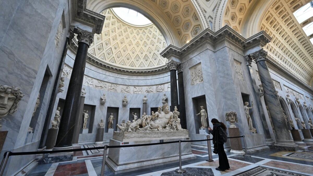 A man visits the Vatican museum on its reopening day, on February 1, 2021 in Vatican City, as the city-state eases its closure aimed at curbing the spread of the COVID-19 infection, caused by the new coronavirus. Andreas SOLARO / AFP