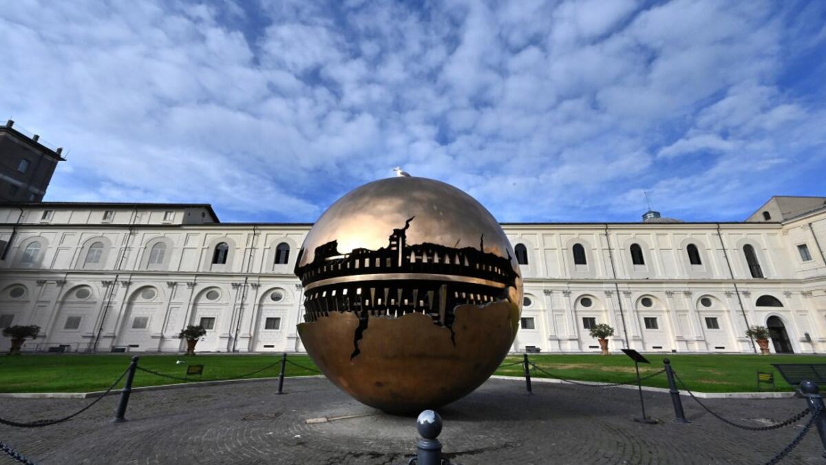 A view shows the Sphere within a sphere by italian artist Arnaldo Pomodoro in the Vatican Museum on its reopening day to the public on February 1, 2021 in Vatican City, as the city-state eases its closure aimed at curbing the spread of the COVID-19 infection, caused by the new coronavirus. Andreas SOLARO / AFP