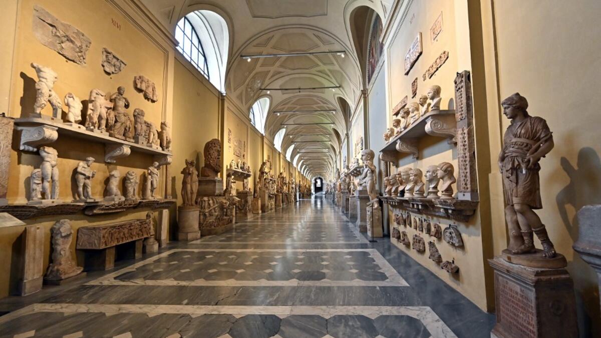 View of a corridor of the Vatican Museum (Musei Vaticani) taken on its reopening day to the public on February 1, 2021 in Vatican City, as the city-state eases its closure aimed at curbing the spread of the COVID-19 infection, caused by the new coronavirus. Andreas SOLARO / AFP