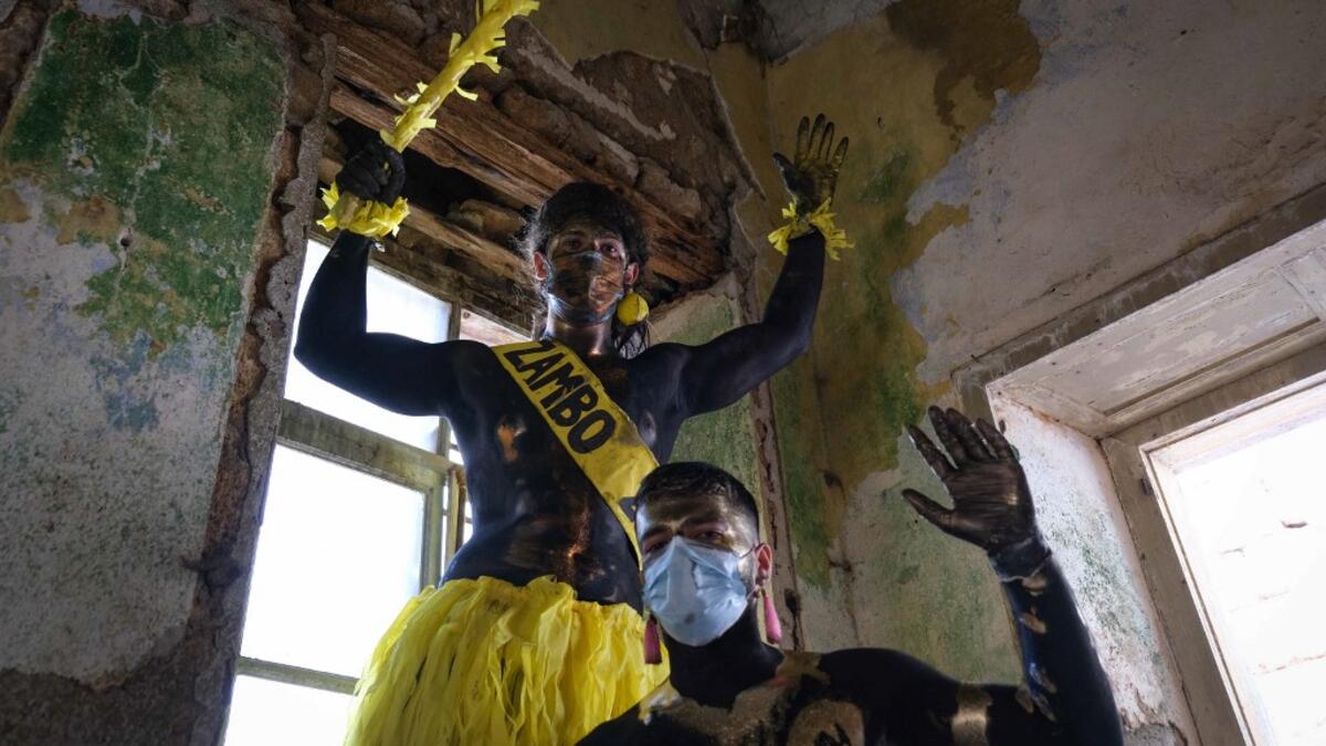Carnival participants dressed in costume and wearing body paint