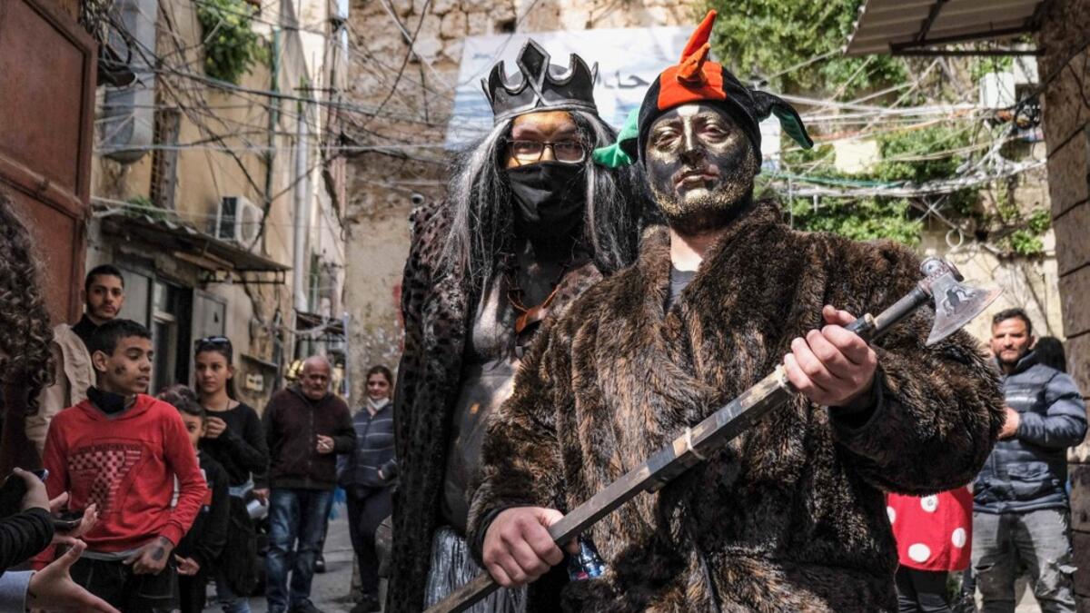 Carnival participants dressed in costume and wearing body paint
