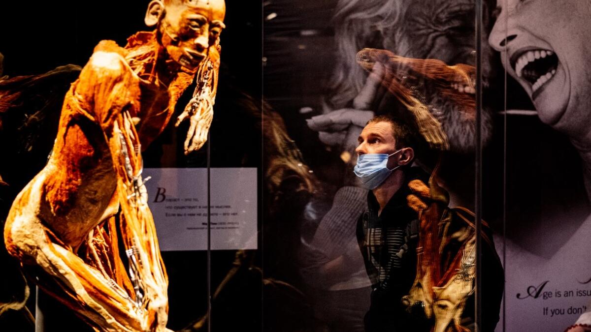 People visit the "Body Worlds", the anatomical art exhibition of plastinated human bodies