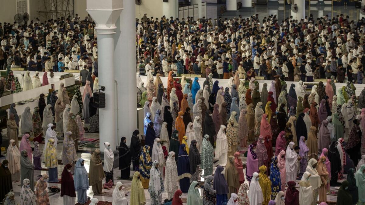 Muslims gather for prayers during the start of the holy month of Ramadan at the Al Akbar Mosque in Surabaya