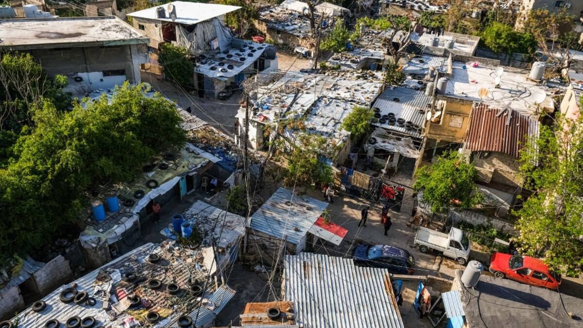This picture  shows an elevated view of shacks where multiple marginalised families reside in the Ghoraba (Strangers) cemetery