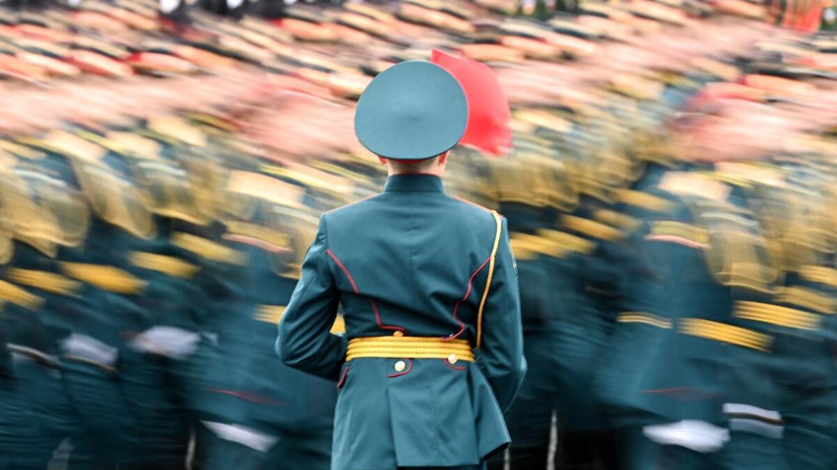 Russian servicemen march along Red Square during the Victory Day military parade in Moscow
