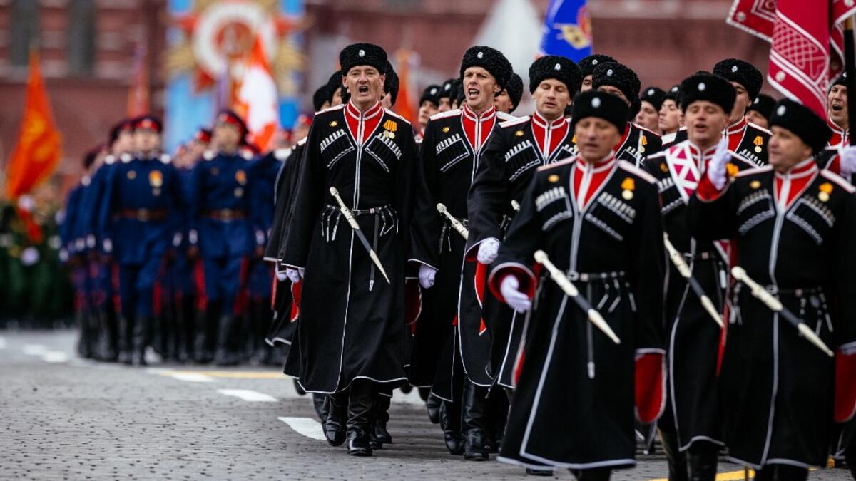 Cossacks march along Red Square during the Victory Day military parade in Moscow on May 9, 2021. Russia celebrates the 76th anniversary of the victory over Nazi Germany during World War II