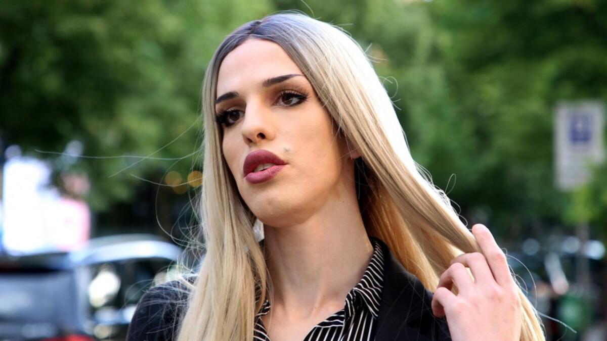 Albanian transgender Denisa, speaks during an interview in a street of Tirana’s city center on May 20, 2021. For the first time, four transgender women decided to participate in an Exhibition "Being Transgender in Albania" to fight the stigma and increase awareness on trans issues.After years of isolation, she and others in the transgender community decided to confront taboos in the open for the first time