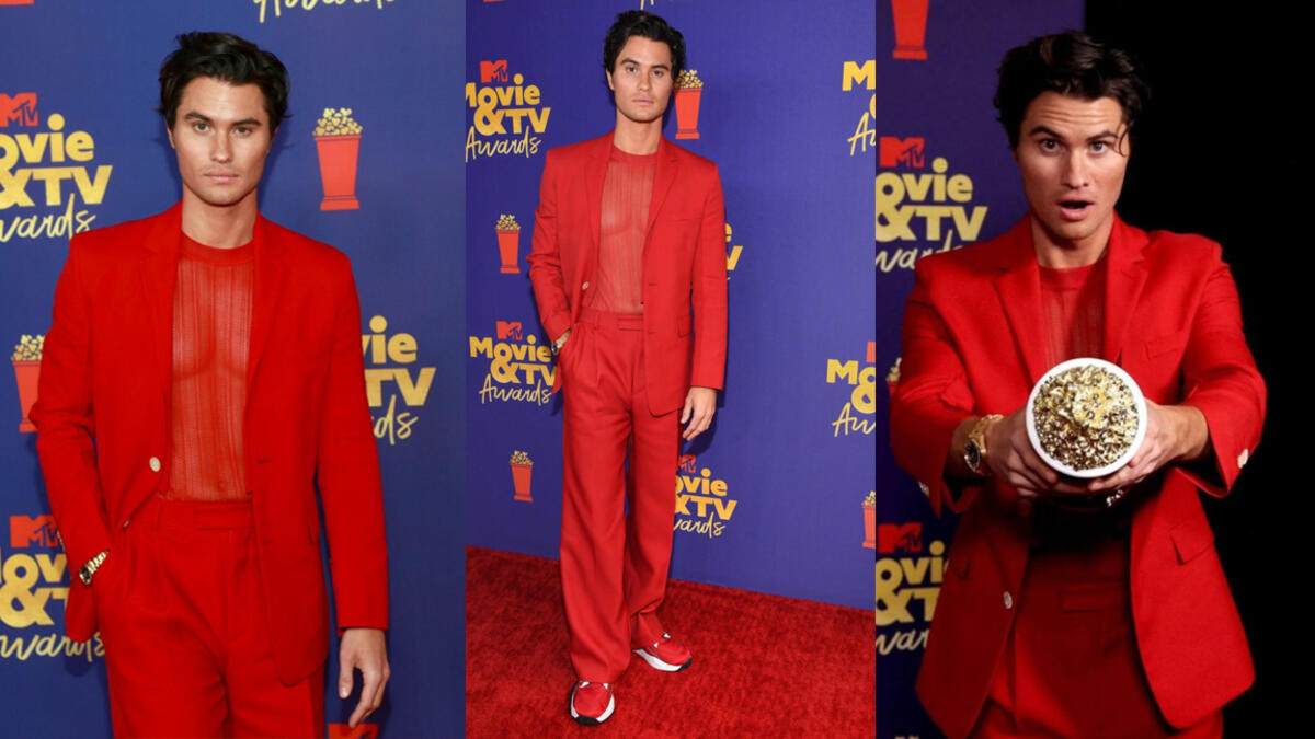 Chase stokes rocked a red Fendi suit and form-fitting see-through top