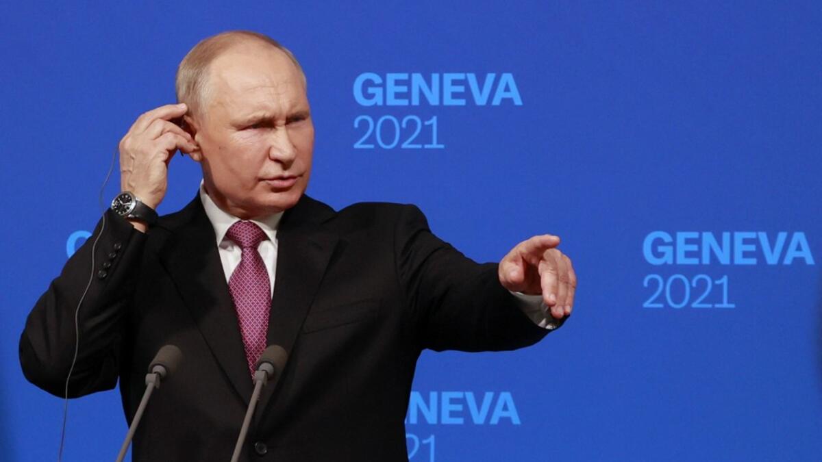 Russia's President Vladimir Putin holds a press conference after meeting with US President in Geneva