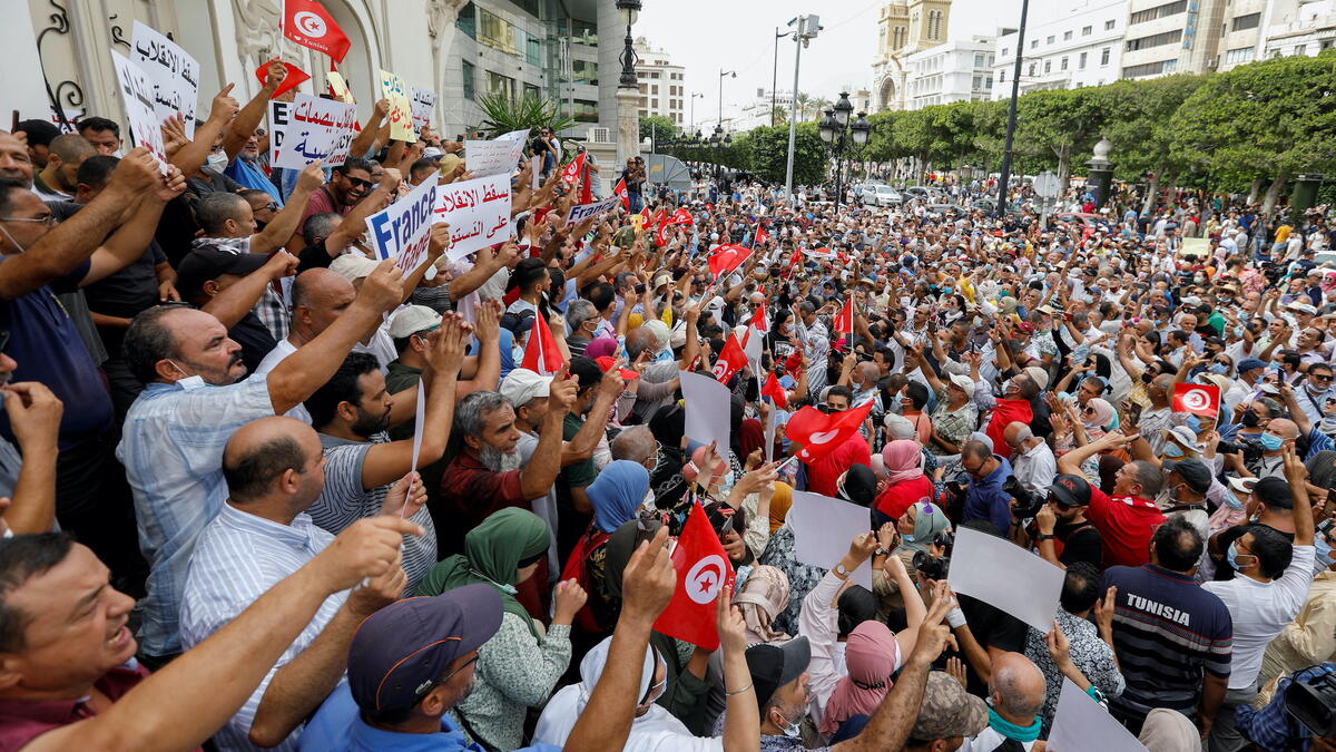 Thousands of demonstrators gather in Tunisian capital Tunis to protest against President Kais Saied's seizure of governing powers in July
