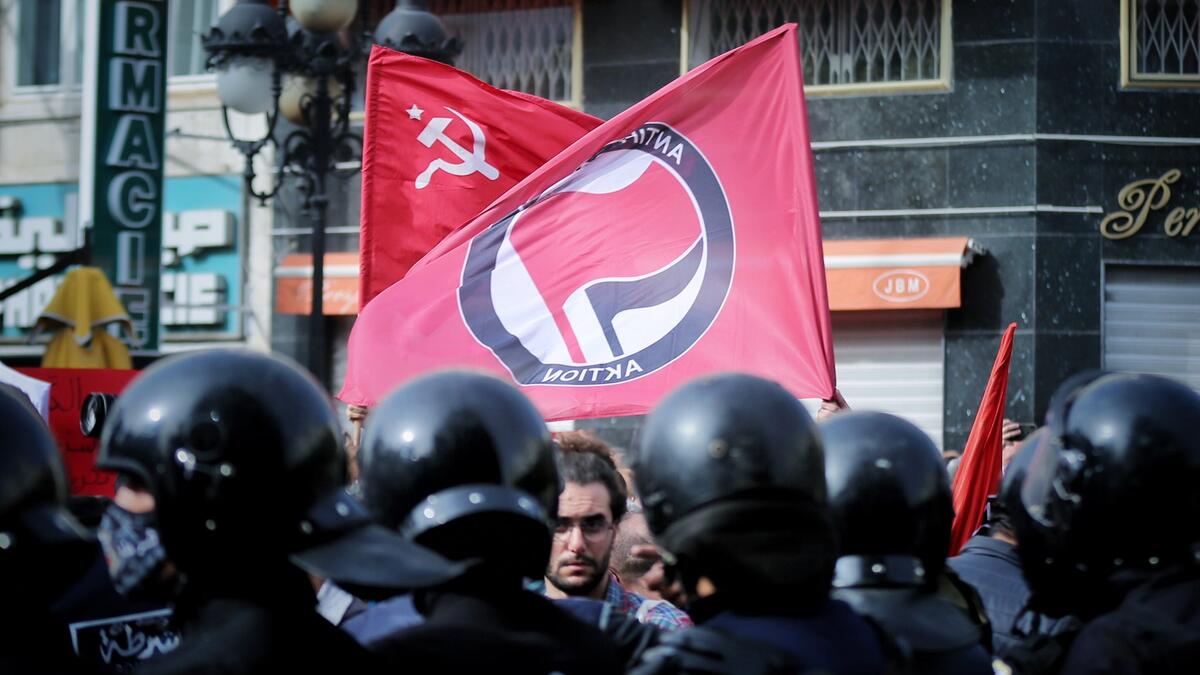 Thousands gather in Tunis in largest protest for years.