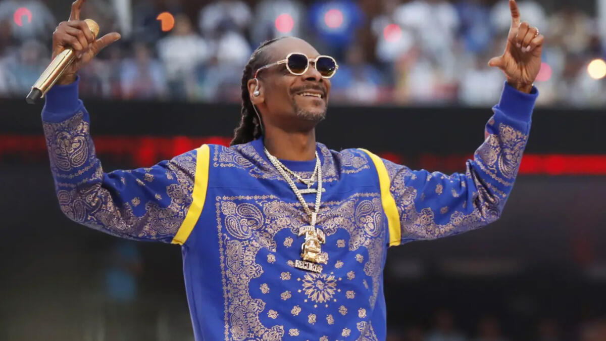 Snoop Dogg smokes a joint before going on stage