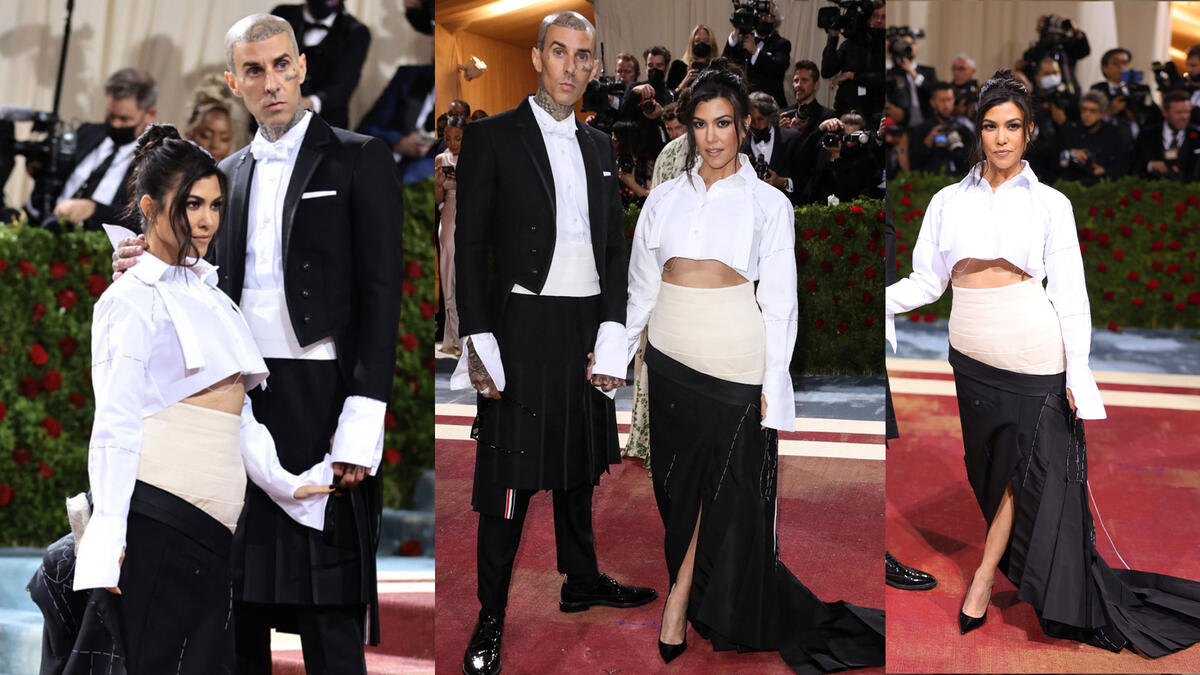 Kourtney Kardashian and Travis Barker in Thom Browne.