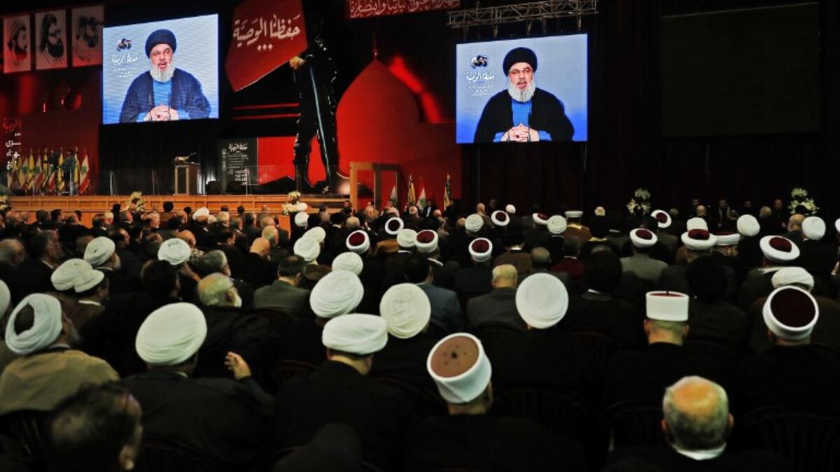 Lebanese Hezbollah Leader Hassan Nasrallah delivers a televised speech during a ceremony held by the Shiite party in the capital Beirut, commemorating the party's killed leaders, on Feb.16, 2018. 
(JOSEPH EID / AFP)