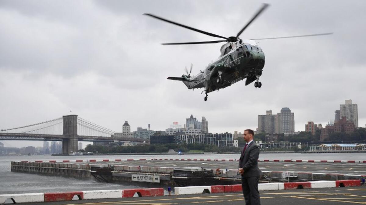 Marine One, carrying US President Donald Trump, lands in lower Manhattan in New York on September 23, 2018. Trump is in New York for the UN General Assembly. 
MANDEL NGAN / AFP