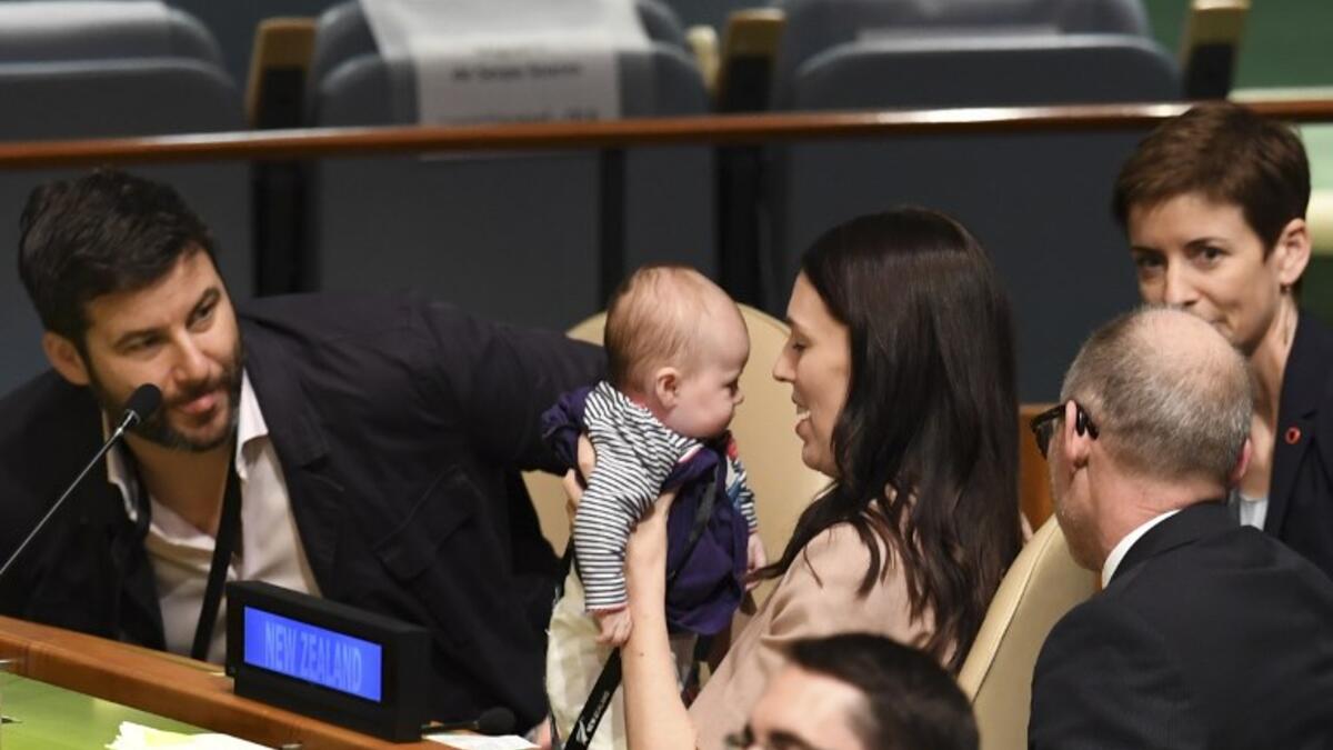 Jacinda Ardern, Prime Minister and Minister for Arts, Culture and Heritage, and National Security and Intelligence of New Zealand looks on at her daughter Neve Te Aroha Ardern Gayford during the Nelson Mandela Peace Summit September 24, 2018
Don EMMERT / AFP