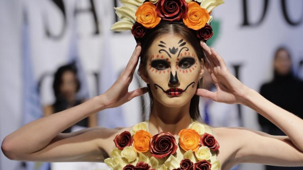 A model displays a chocolate dress at the 2018 chocolate fair fashion show in Beirut on November 8, 2018. 
JOSEPH EID / AFP