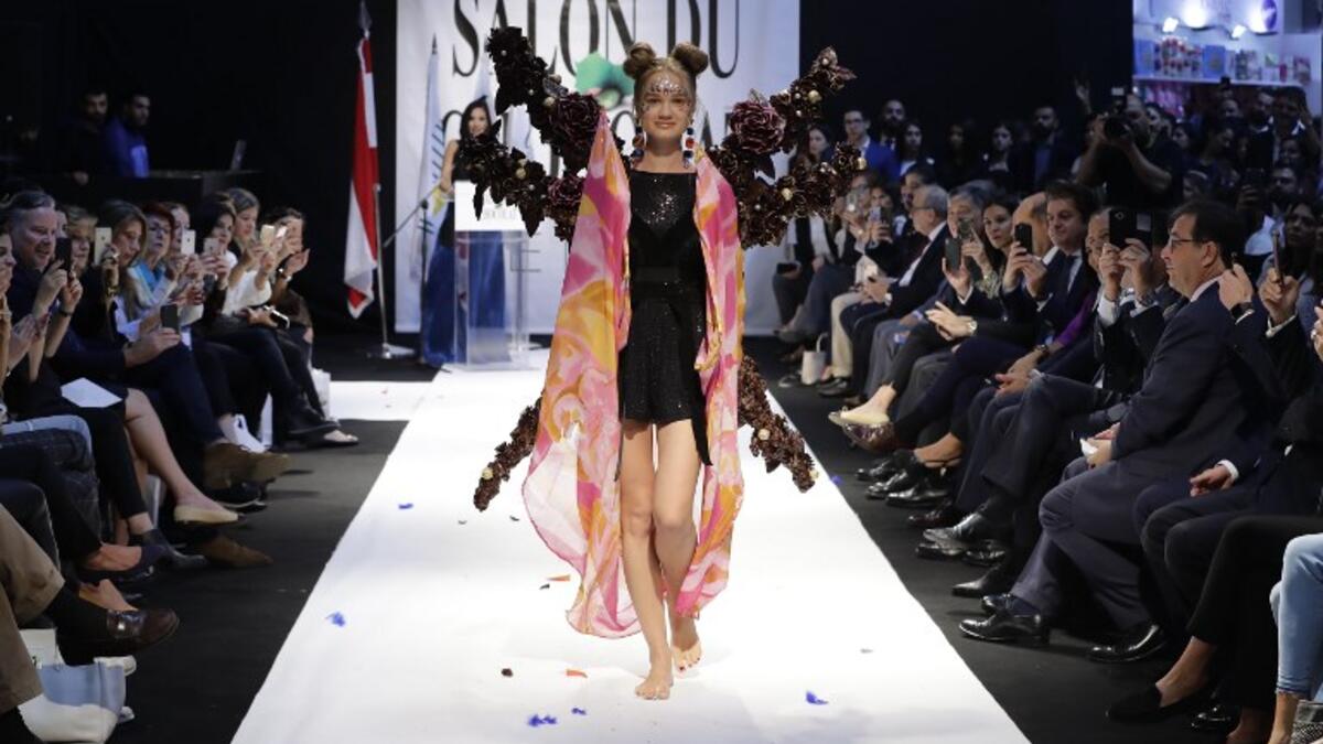 A model displays a chocolate dress at the 2018 chocolate fair fashion show in Beirut on November 8, 2018. 
JOSEPH EID / AFP