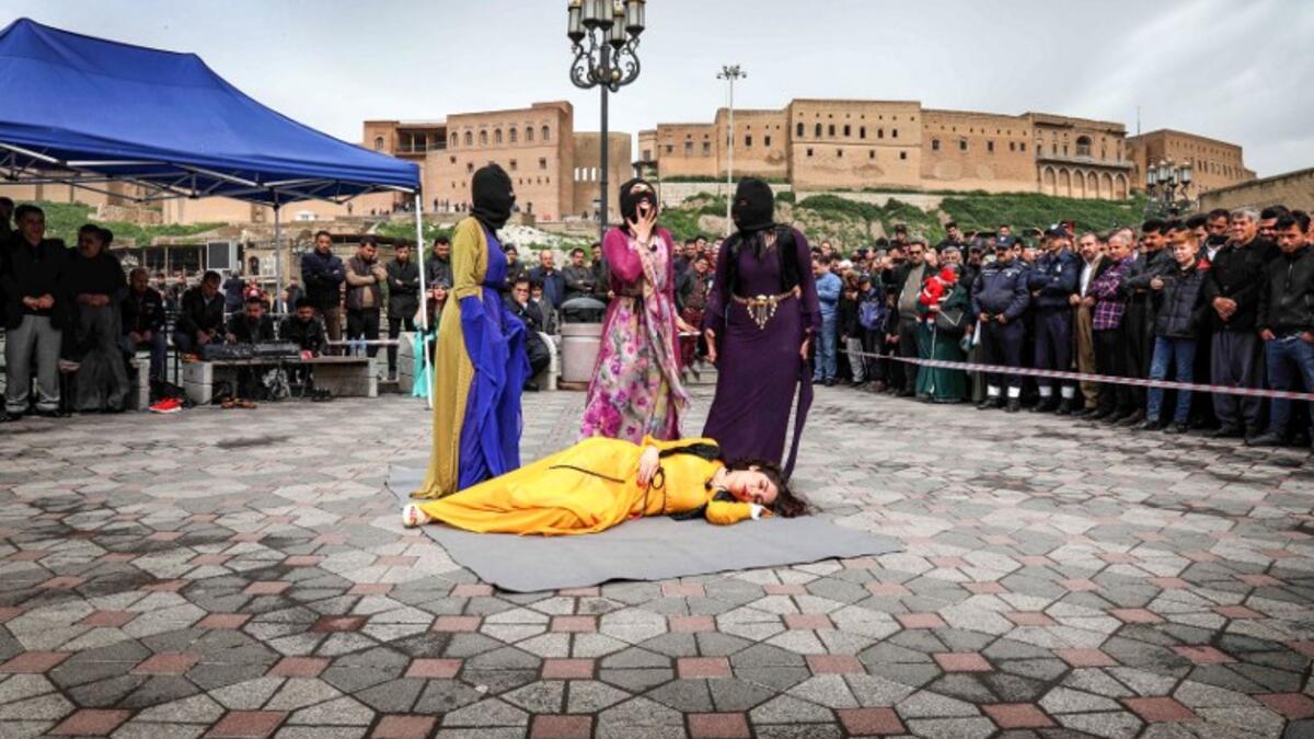 Iraqi Kurdish actresses perform in an open-air play in Arbil, the capital of the northern Iraqi Kurdish autonomous region
SAFIN HAMED / AFP