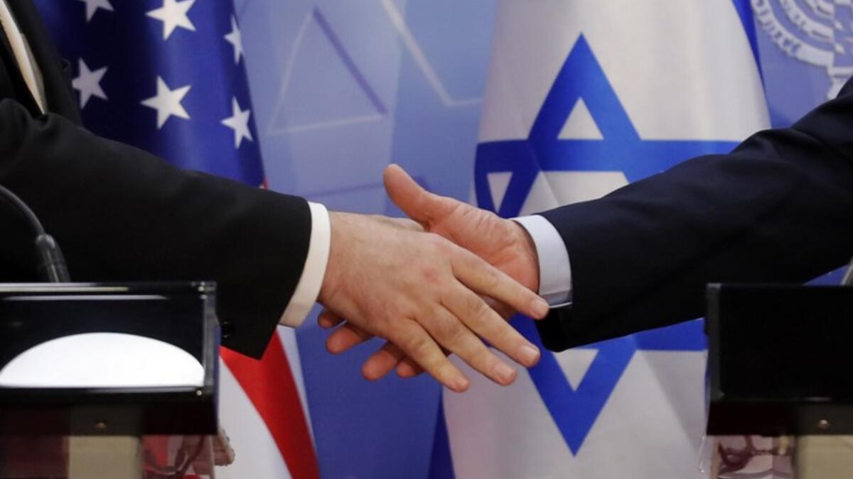 Pompeo and Netanyahu vowed today to counter Iranian "aggression" as the two met in Jerusalem just weeks ahead of Israel's elections.

JIM YOUNG / POOL / AFP