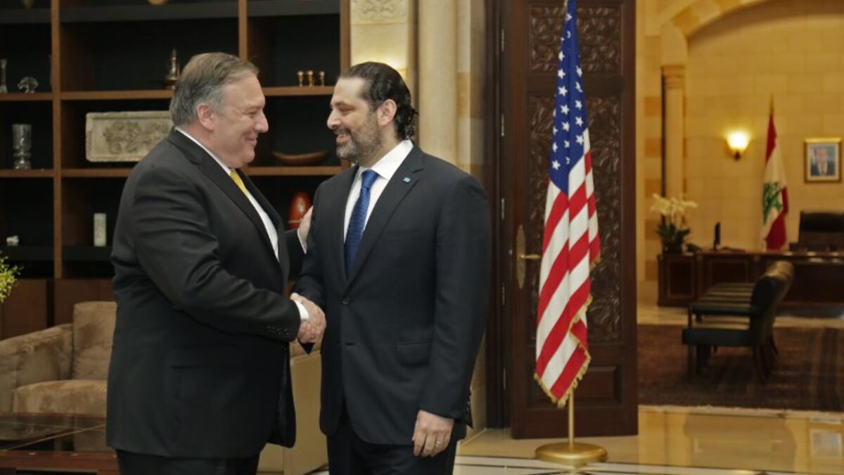 US Secretary of State Mike Pompeo (L) is welcomed by Lebanon's Prime Minister Saad Hariri (R) upon his arrival to the capital Beirut on March 22, 2019. 
ANWAR AMRO / AFP