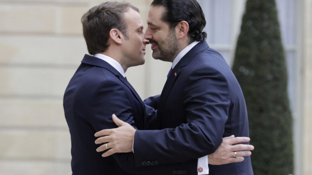French President Emmanuel Macron (L) welcomes Lebanese Prime Minister Saad Hariri at the Elysee Presidential Palace in Paris. 

Hariri is in Paris at the invitation of France's President who is attempting to help broker a solution to a political crisis that has raised fears over Lebanon's fragile democracy.

(Thomas SAMSON / AFP)