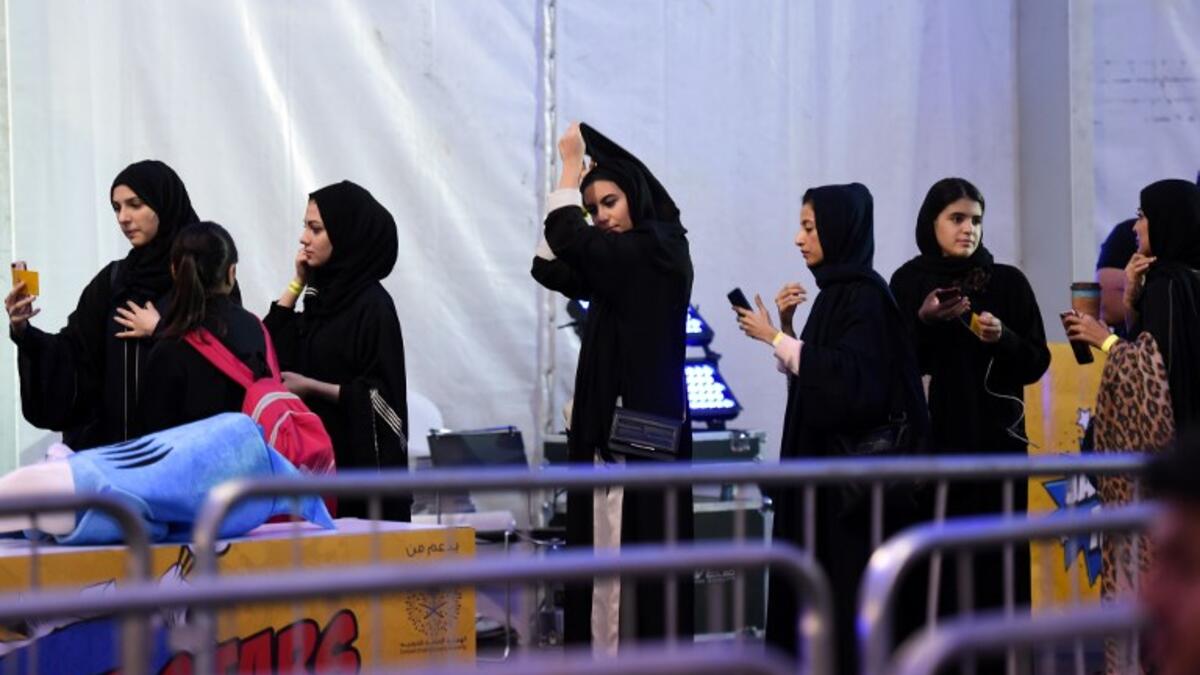 Saudi girls attend the first ever Comic-Con Arabia event held in the capital Riyadh on November 25, 2017. 
(FAYEZ NURELDINE / AFP)
