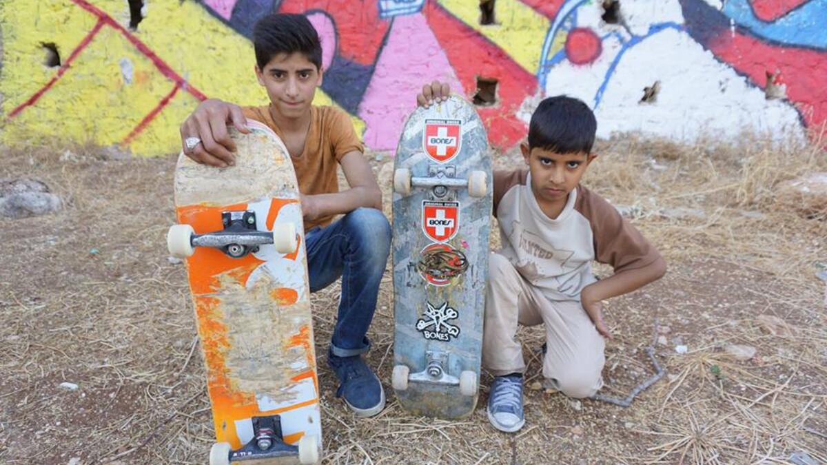 Young skates: Ahmad, age 15 and his little brother Mohammad, age 8 (Facebook)