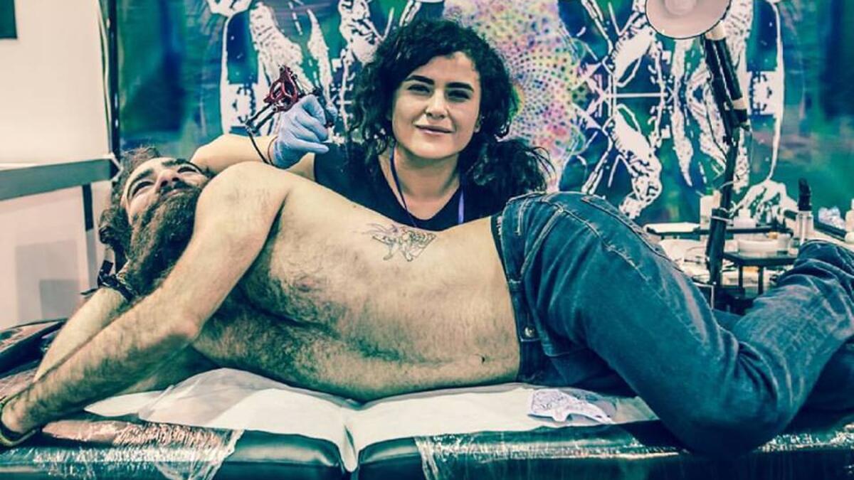 Paint becomes pleasure while getting inked (Facebook)