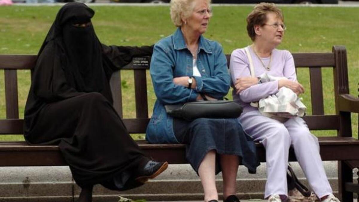 woman-burqa-park-bench-public-elderly-freemalaysiatoday.com-2015