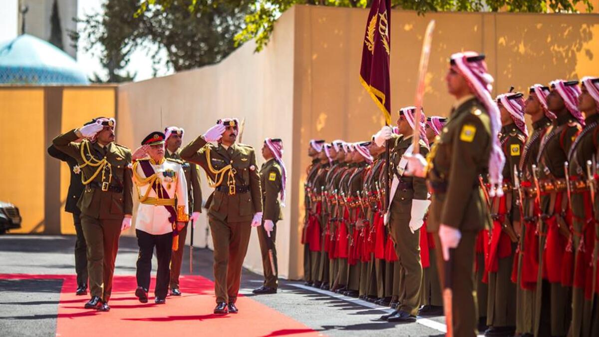 Jordan's King Abdullah II salutes the honour guard upon his arrival at parliament, for the third regular session session in the capital Amman on October 14, 2018. (Faceook/ @RHCJO)