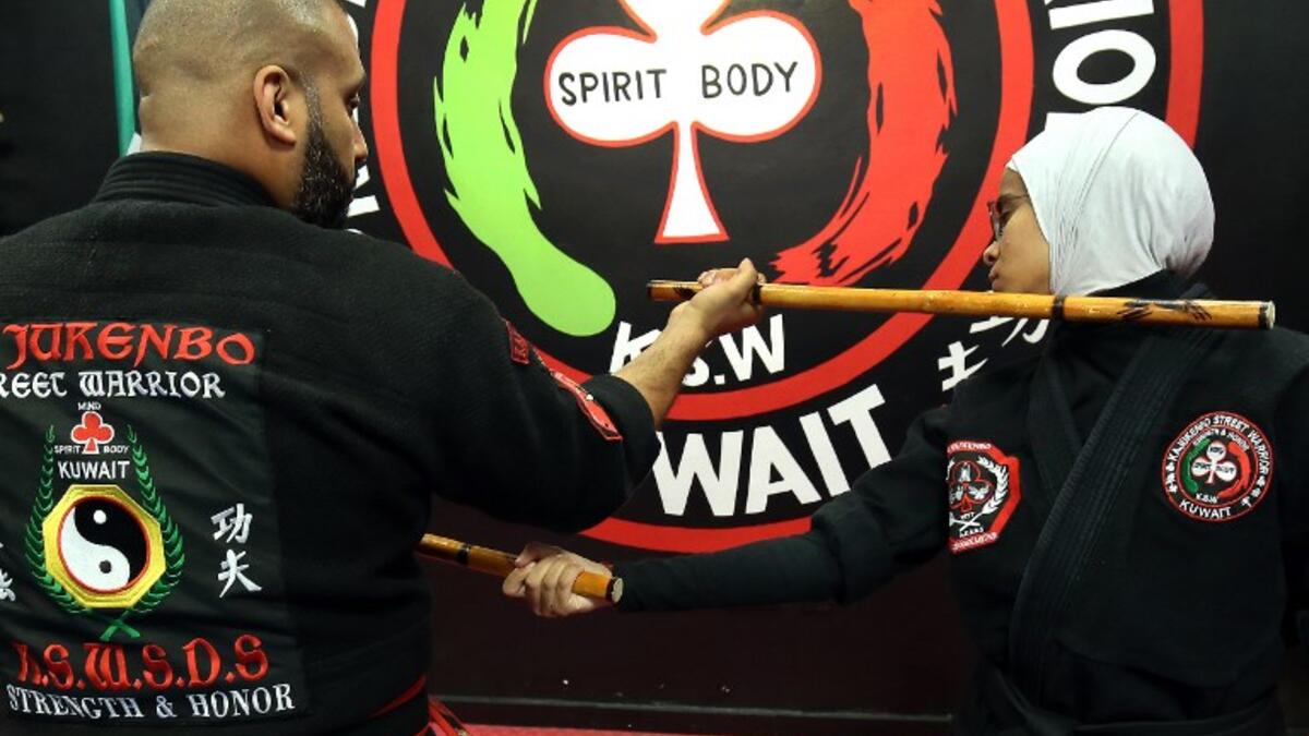 Kuwaiti women practise hybrid martial art Kajukenbo in a club in Kuwait City.
Yasser Al-Zayyat / AFP
