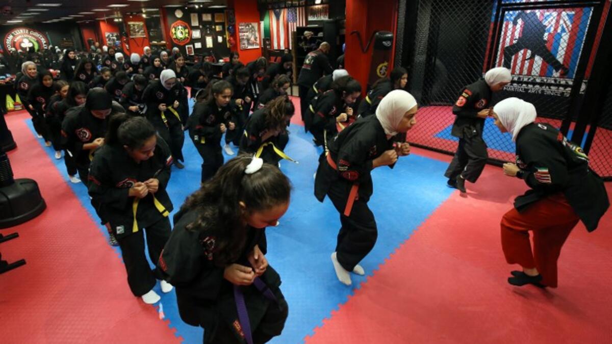 Kuwaiti women practise hybrid martial art Kajukenbo in a club in Kuwait City.
Yasser Al-Zayyat / AFP