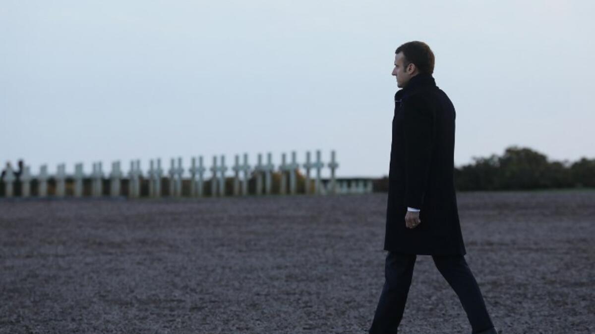 French President Emmanuel Macron takes part in a commemoration ceremony at the Notre Dame de Lorette World War I French war cemetery in Ablain-Saint-Nazaire, northern France, on November 8, 2018, as part of a World War I commemoration tour. 
Ludovic MARIN / AFP