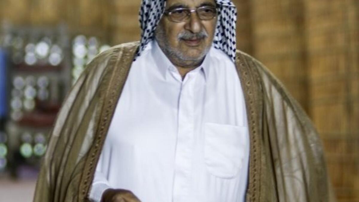 A member of an Iraqi clan is pictured inside a straw tent in the town of Mishkhab, south of Najaf on November 15, 2018. 
Haidar HAMDANI / AFP