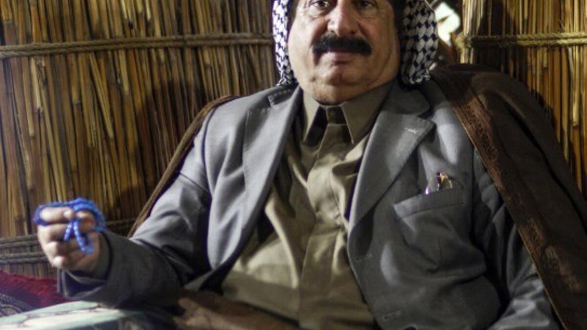 A member of an Iraqi clan is pictured inside a straw tent in the town of Mishkhab, south of Najaf on November 15, 2018.
Haidar HAMDANI / AFP