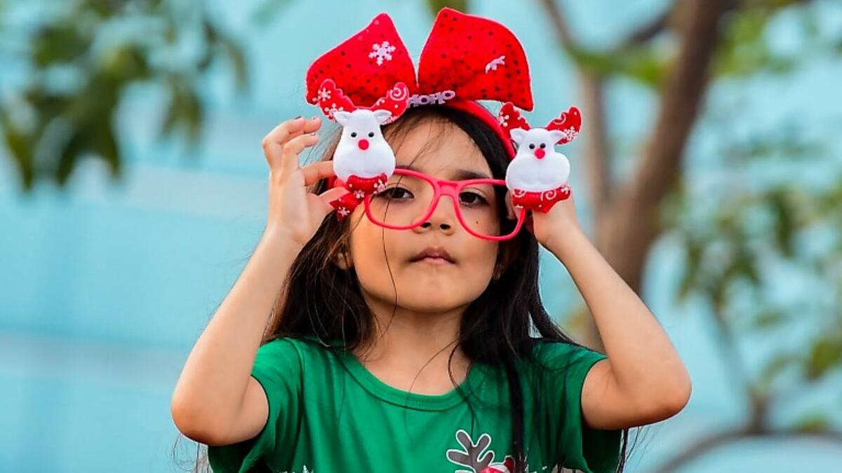 A kid takes part of the Christmas parade in Panama City on December 16, 2018. 
Luis ACOSTA / AFP