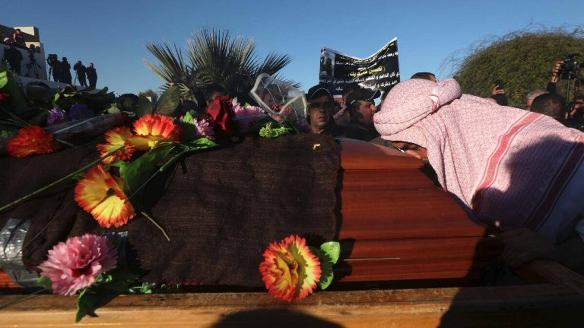 Iraqi Yazidis attend the funeral of the Mir Takhsin-Beg (Tahseen Said Ali), the hereditary leader of the Yazidi community in the world, in the town of Sheikhan, 50km northeast of Mosul.
SAFIN HAMED / AFP