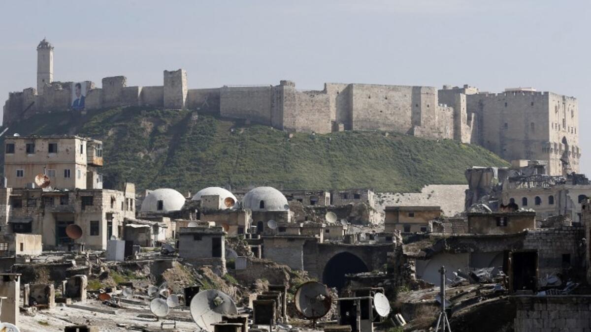 A general view shows the Saqatiya market, during restoration, and the Citadel of Aleppo, in the old quarter of Syria's second city of Aleppo 
LOUAI BESHARA / AFP