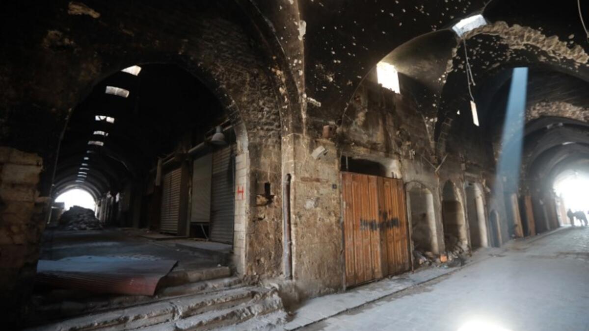 A general view shows the damaged inflicted on the Old Aleppo markets in the old quarter of Syria's second city of Aleppo 
LOUAI BESHARA / AFP
