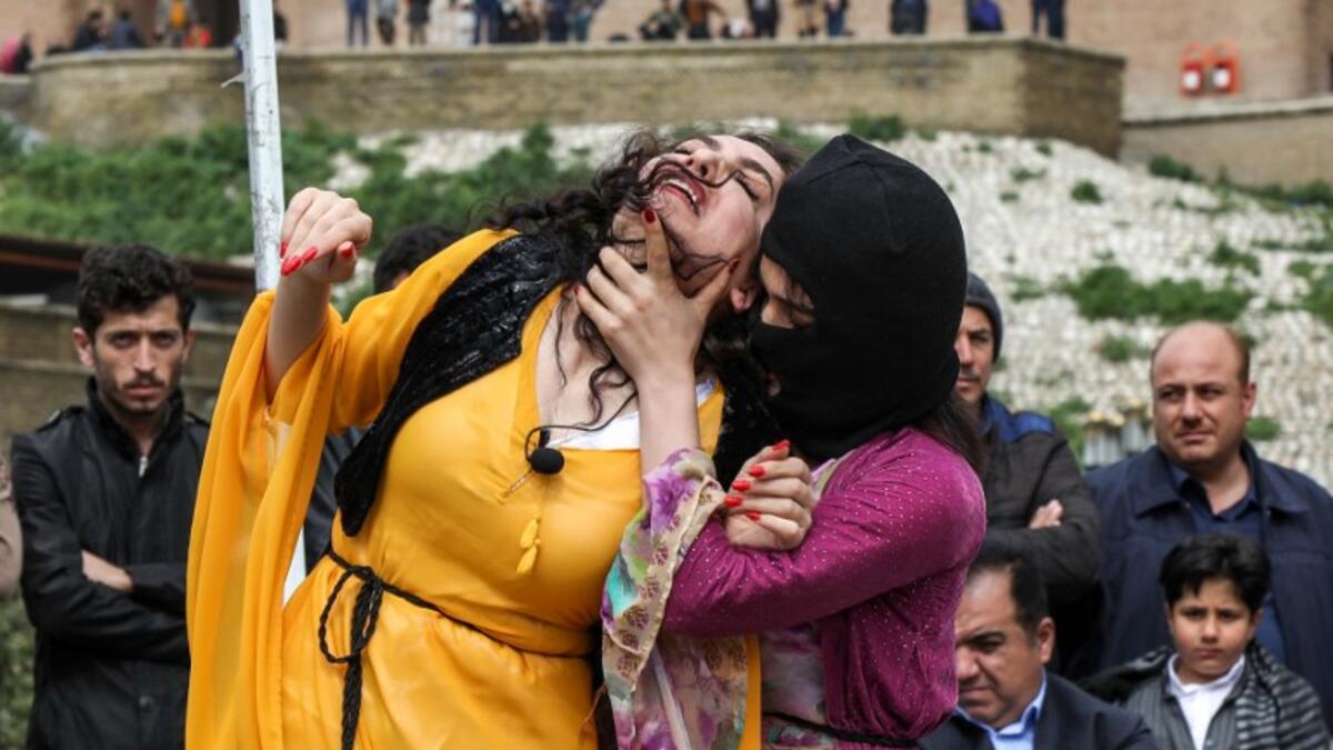 Iraqi Kurdish actresses perform in an open-air play in Arbil, the capital of the northern Iraqi Kurdish autonomous region
SAFIN HAMED / AFP