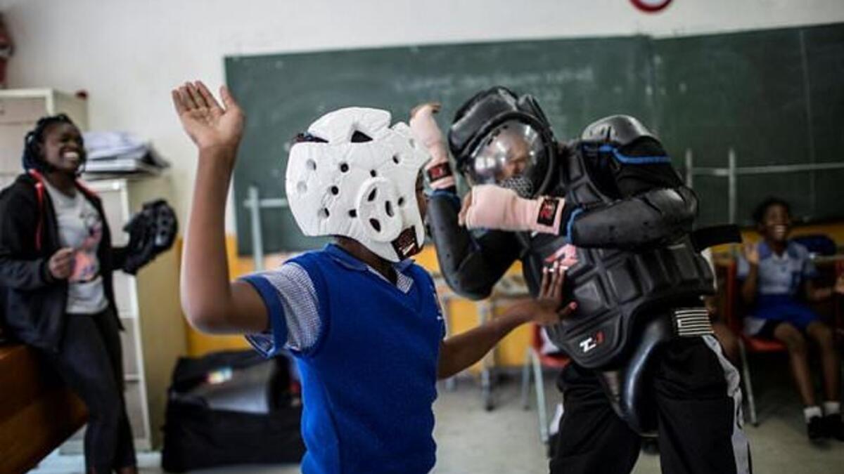 Girls are taught how to defend themselves physically but also how to identify and respond to potentially dangerous situations. (AFP/File)