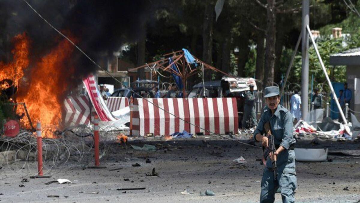 Guard stand at the scene of the the suicide bomb attack that targeted a voter registration centre in Kabul, Afghanistan on April 22, 2018. (AFP/ File Photo)