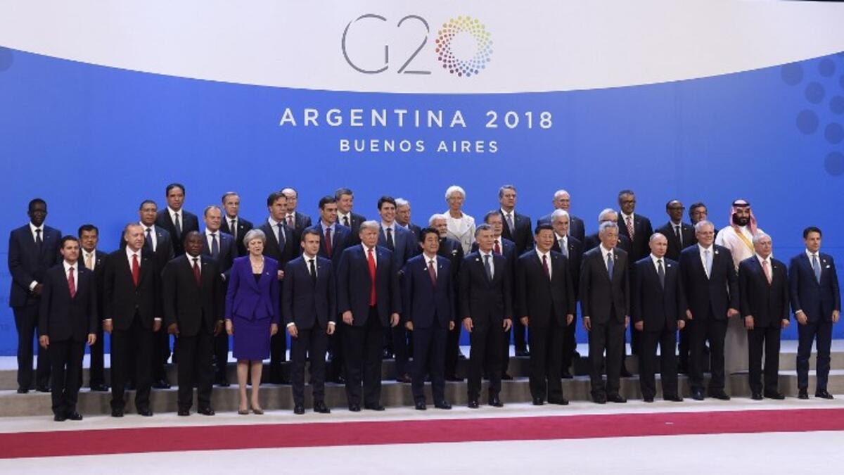 Participants of the G20 Leaders' Summit in Buenos Aires, pose for a family photo on November 30, 2018. Global leaders gather in the Argentine capital for a two-day G20 summit beginning on Friday likely to be dominated by simmering international tensions over trade.
SAUL LOEB / AFP