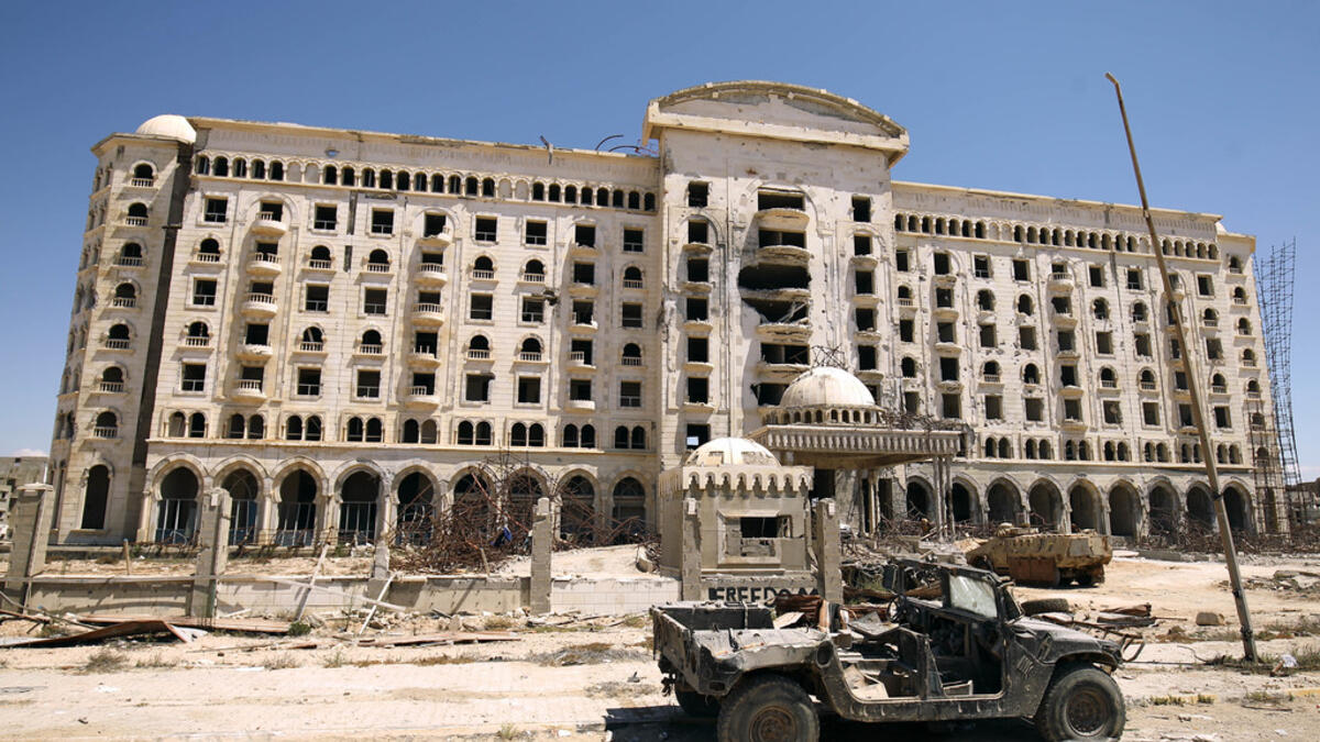 The Fight for Benghazi:

Haftar’s army began an assault on the Islamist-held city of Benghazi in 2014. The operation saw the Libyan National Army fighting jihadist groups such as IS and the Shura Council of Benghazi Revolutionaries. The city was ‘liberated’ by Haftar’s forces by July 2017.

(Photo: A destroyed building in Benghazi)
