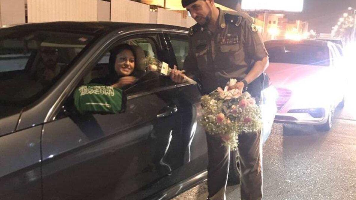 Police distributed flowers to women drivers on their first day of driving in the country. (Twitter)