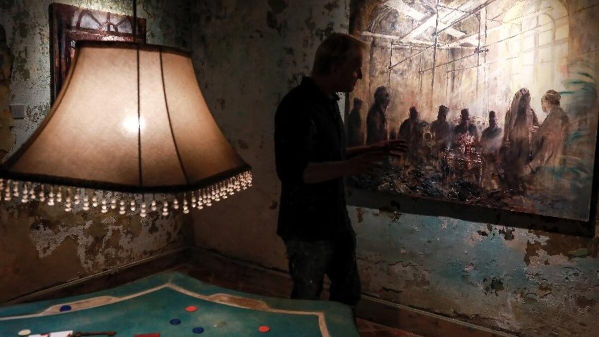 Once the haunt of Arab diplomats, French and British officers, and Egyptian stars. The paintings are by Tom Young celebrating the legendary hotel's cosmopolitan past (AFP)