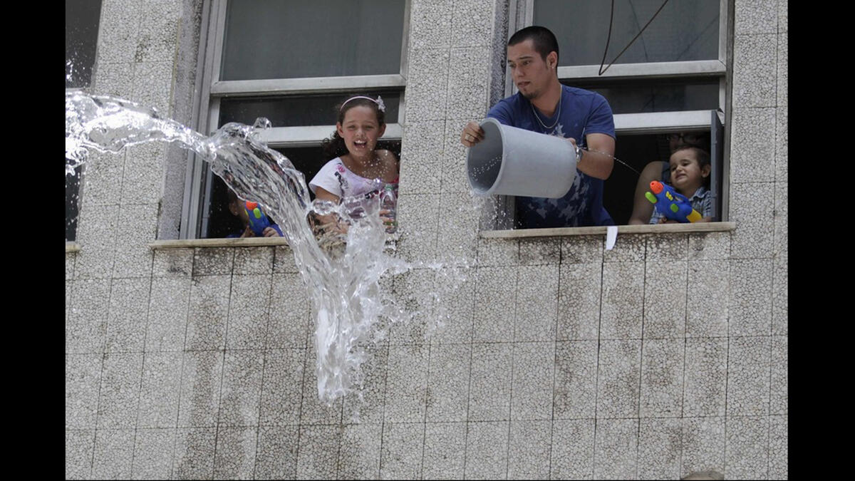 water buckets guns splashing
