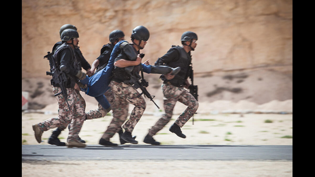 During the “hostage rescue,” team members had to storm a building, shoot at moving targets, and carry their casualty to a waiting truck to leave the area.