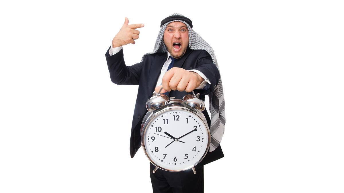 Arab man clock